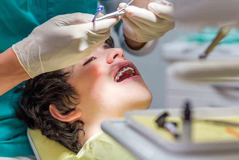 dental patient getting custom braces